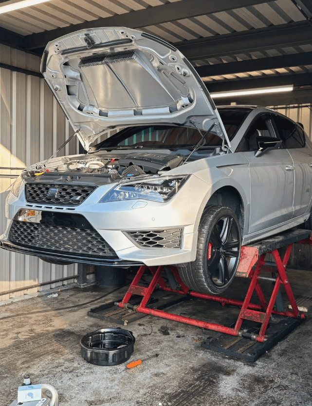 Mechanic working on a car